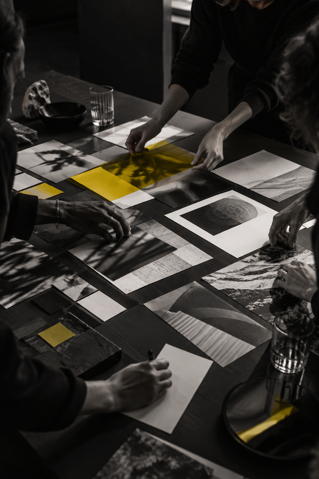 Creative team collaborating around brand materials